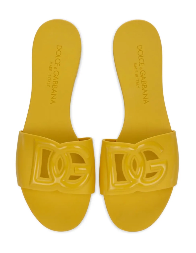 A photo of yellow Dolce and Gabbana slide