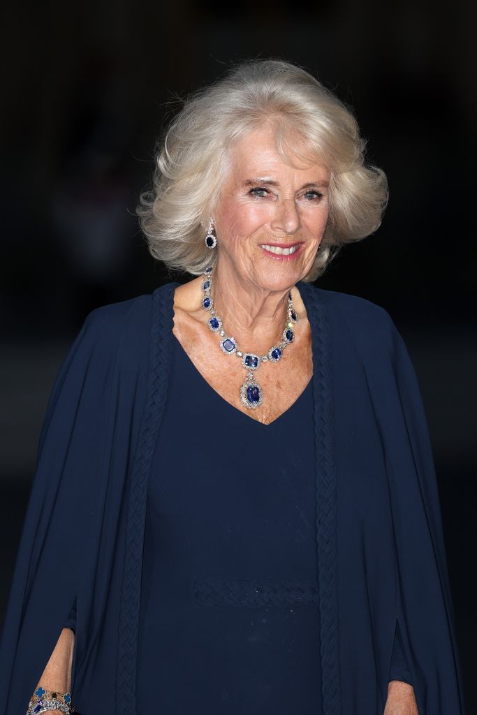 Queen Camilla in midnight-blue goen and sapphire necklace