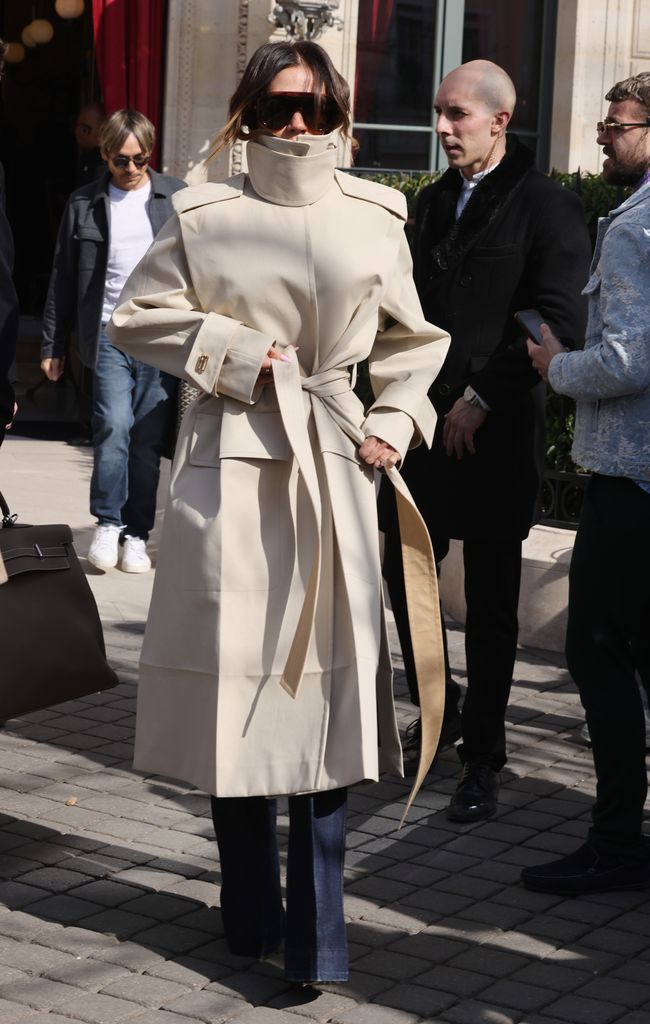 Victoria Beckham wrapped up warm in her trench coat