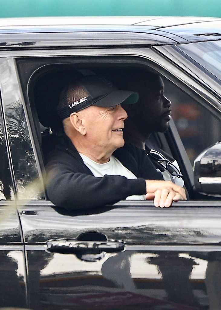 Bruce Willis is spotted in high spirits during a relaxing drive through Studio City