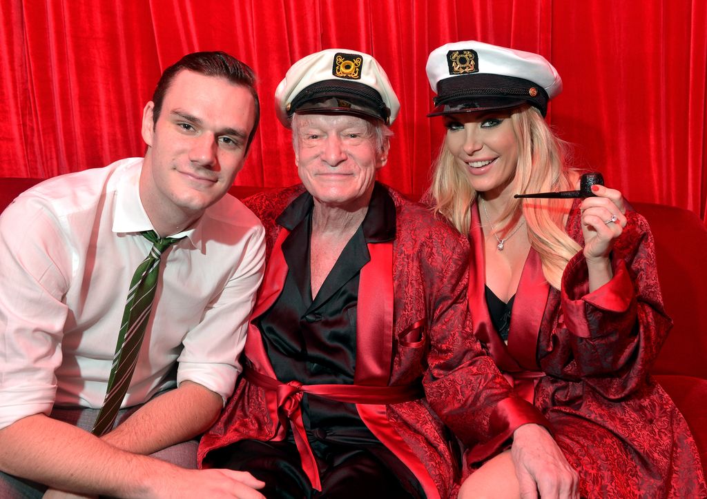 Los Angeles, CA - OCTOBER 25:  (L-R) Cooper Hefner, Hugh Hefner and Crystal Hefner attend Playboy Mansion's Annual Halloween Bash at The Playboy Mansion on October 25, 2014 in Los Angeles, California.  (Photo by Charley Gallay/Getty Images for Playboy)
