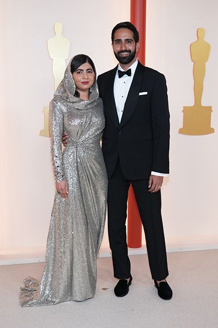 malala yousafzai wearing silver glittering look with husband yasser malik on oscars red carpet
