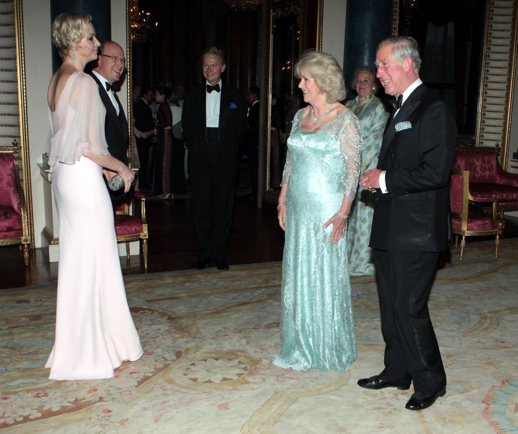 Prince Charles and Camilla greet Prince Albert II and Princess Charlene