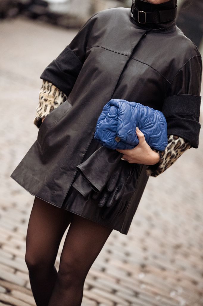 A delicate pop of blue, like a clutch bag, is a subtle nod to the trend