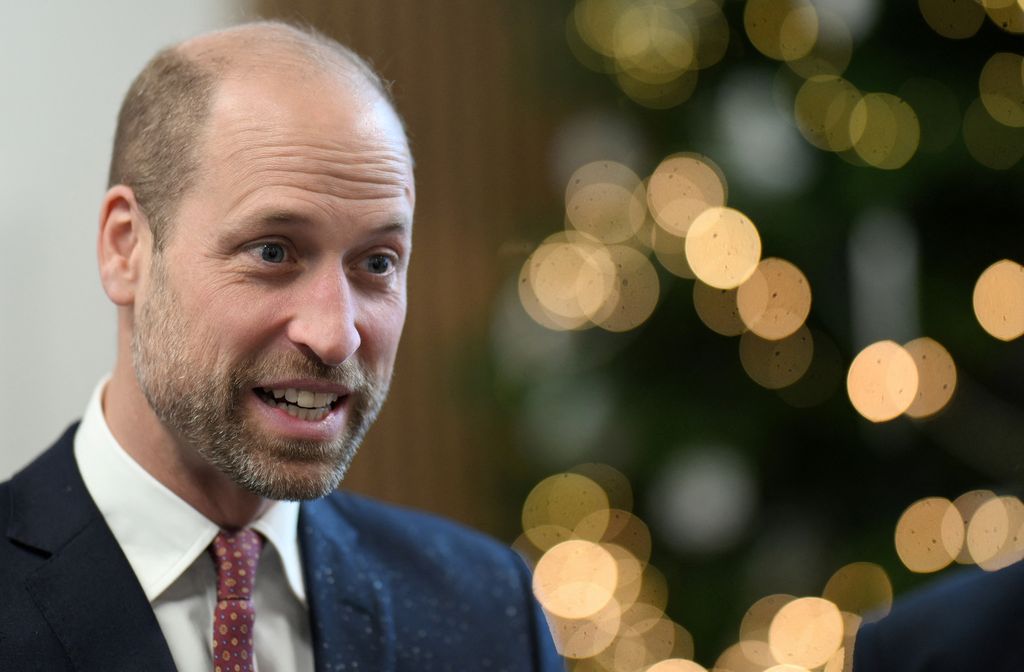 Prince William with lit up backdrop