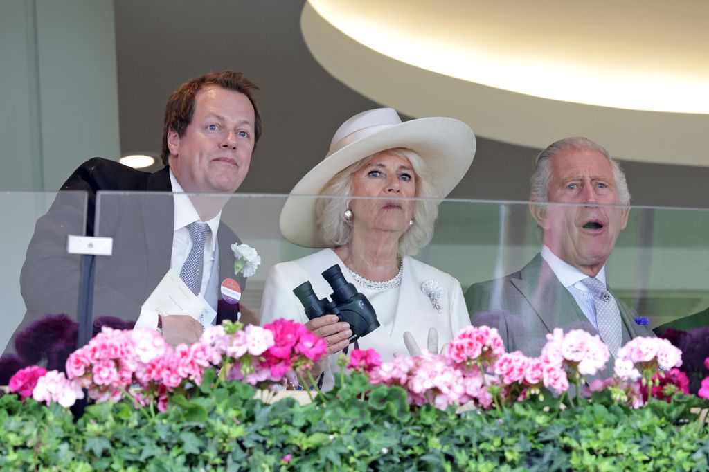 Tom Parker Bowles, Queen Camilla and King Charles III watch a race during day one of Royal Ascot 2023