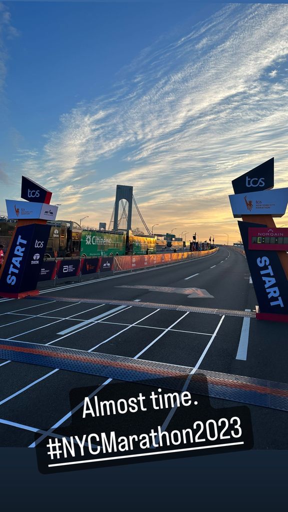 Amy Robach and T.J. Holmes shared identical photos at the starting line at the New York Marathon