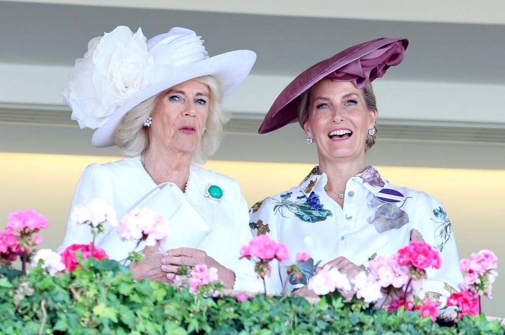 Queen Camilla and Sophie, Duchess of Edinburgh talk with each other as they attend day three of Royal Ascot 2024
