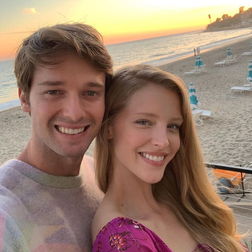 Abby Champion and Patrick Schwarzenegger taking a selfie on the beach