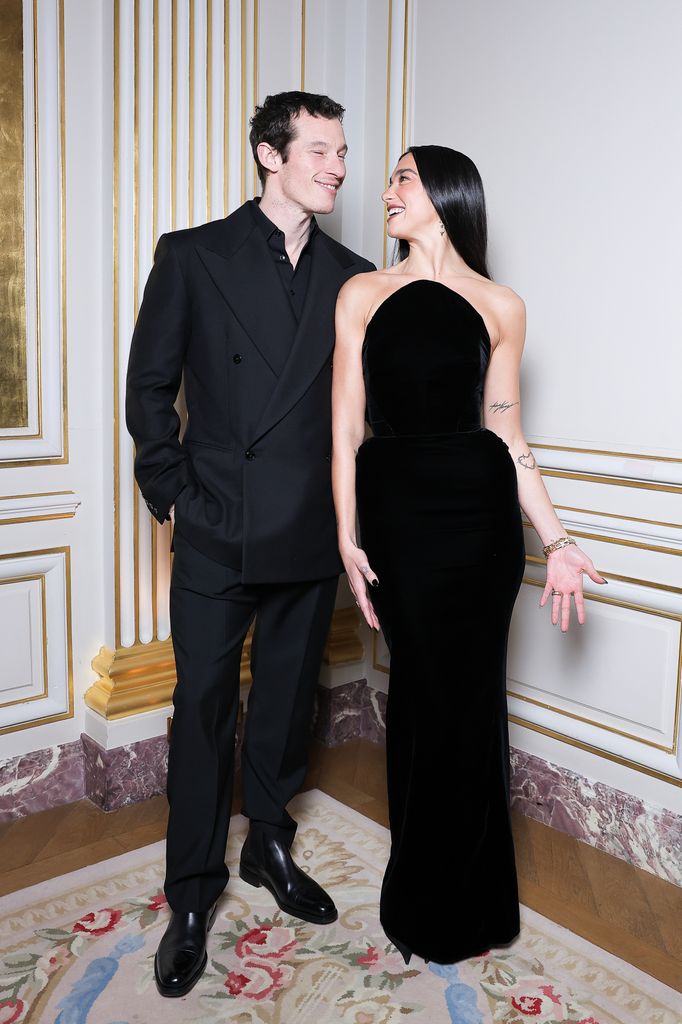 Dua Lipa and Callum Turner pose together for a photo at a Tiffany & Co. event in Paris