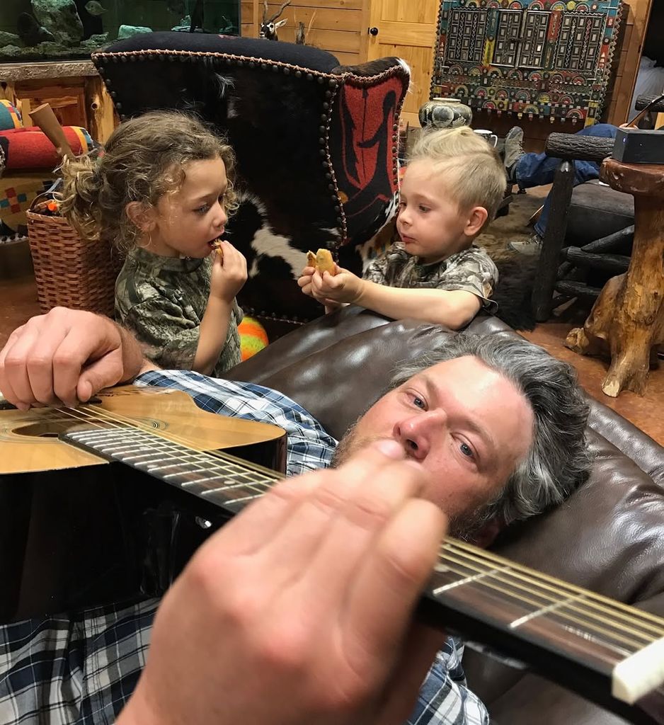 Blake Shelton plays on his guitar with his stepson Apollo and his cousin playing in the background, shared on Instagram