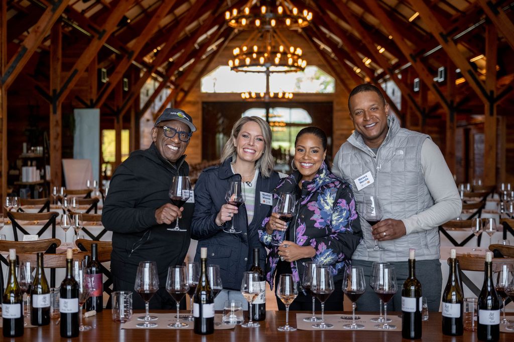 Al Roker, Sheinelle Jones, Dylan Dreyer and Craig Melvin smiling during a wine tasting