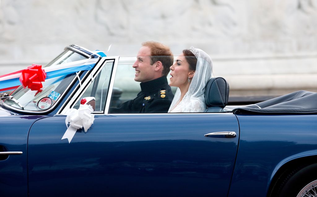 Princess Kate whooping in the wedding car with Prince William 