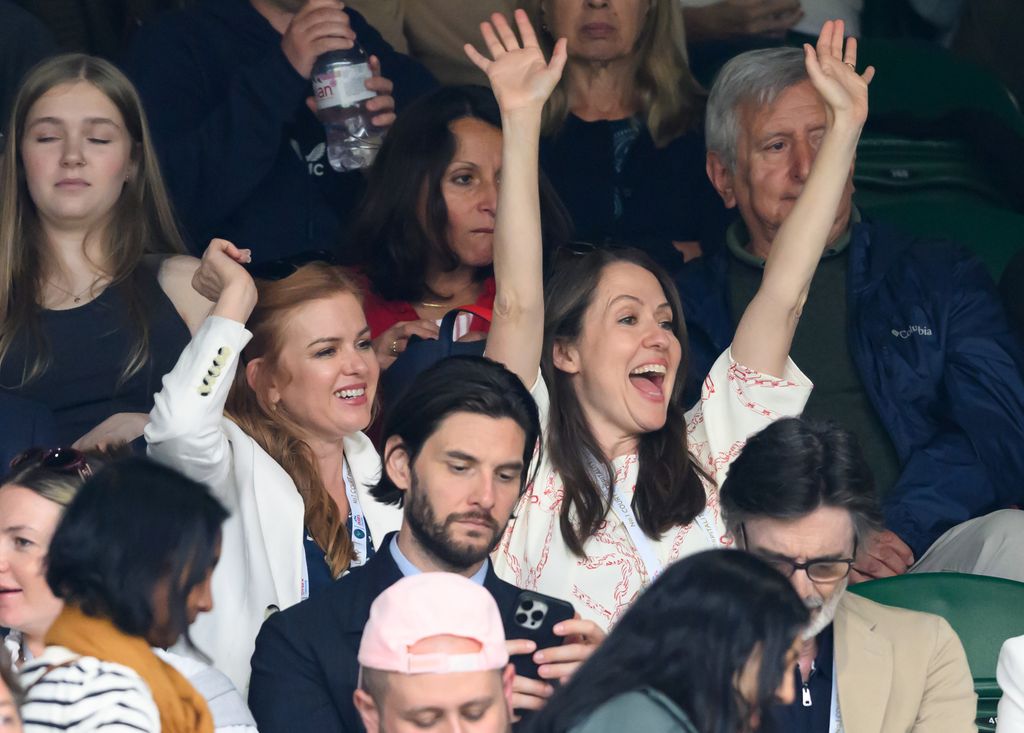 Isla is glowing as she watches the match