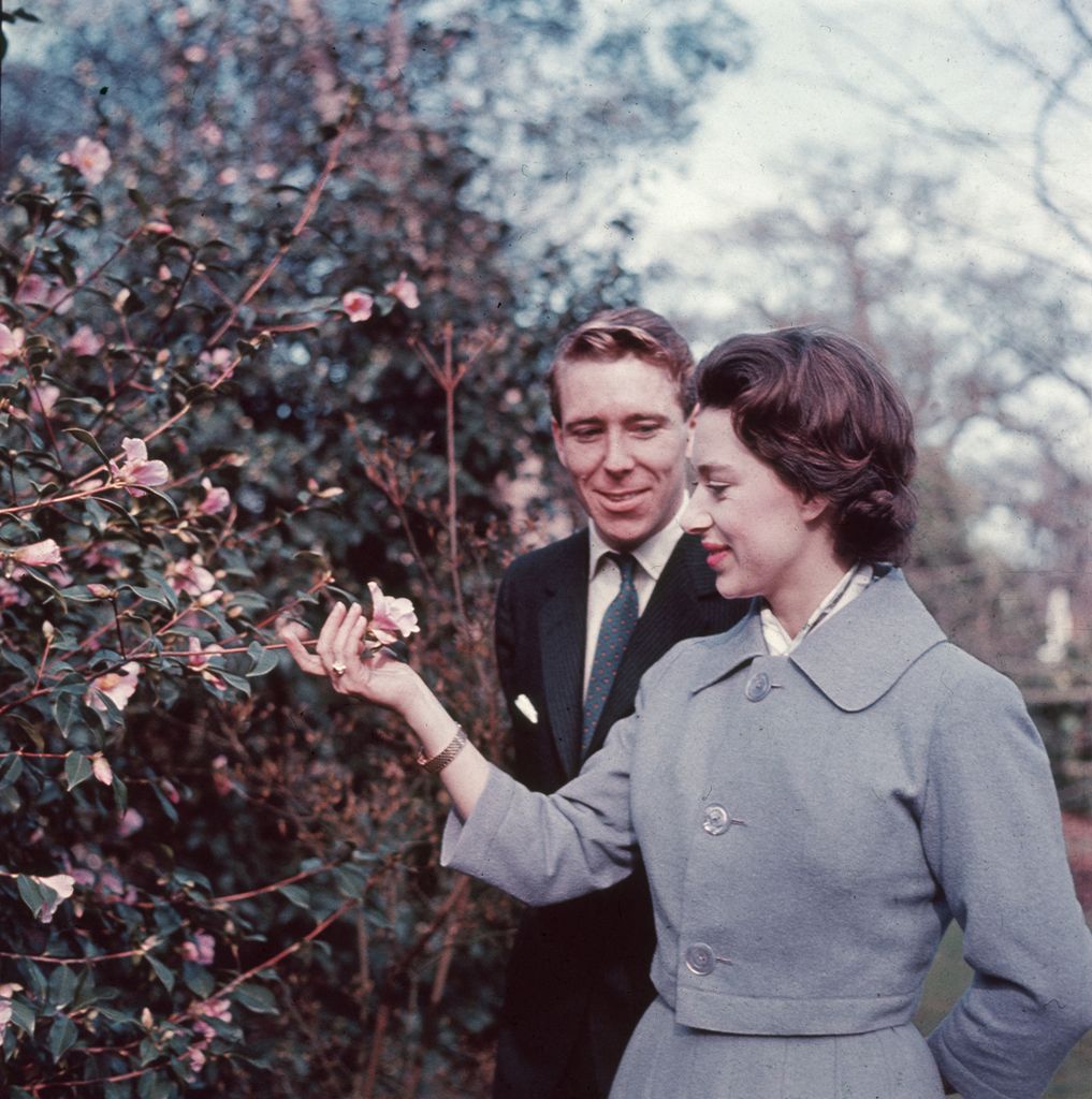 Antony Armstrong-Jones and Princess Margaret; Margaret is holding a flower