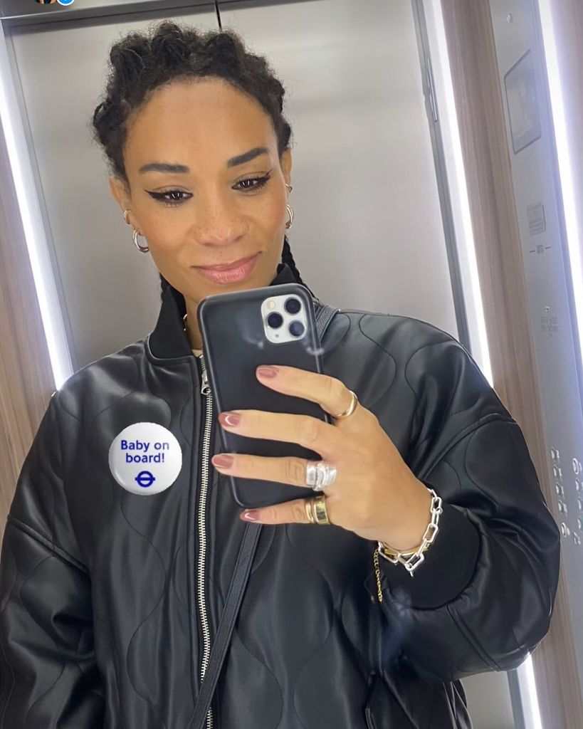 Michelle lift selfie in black jacket