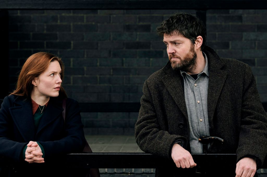 Robin Ellacott and Cormoran Strike in The Ink Black Heart