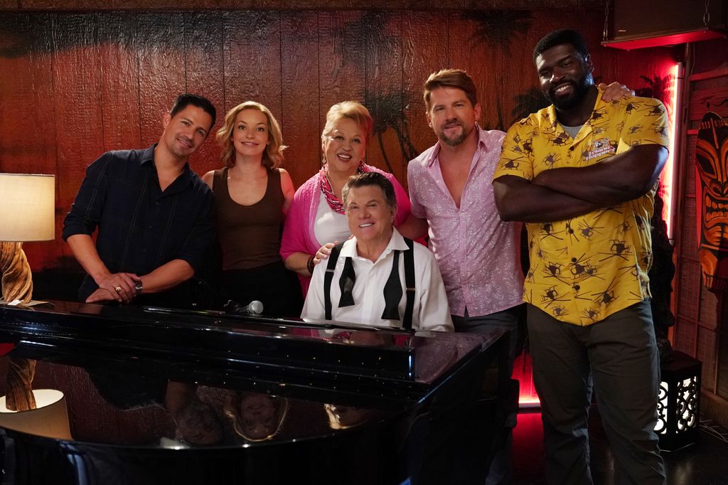 Larry Manetti with the cast of the the Magnum P.I. reboot