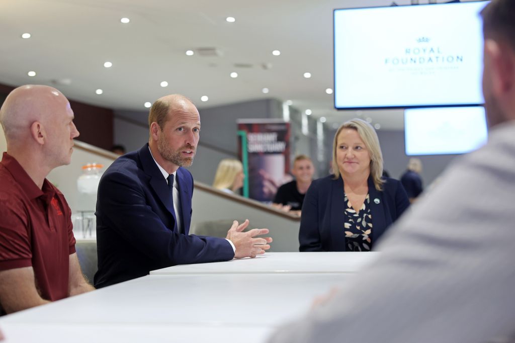 The Prince of Wales talked to teammates from Jac's football team Ammanford FC 