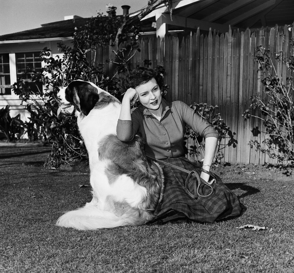 BETTY WHITE -- Pictured: Dog Stormy, actress Betty White at home in 1954 -- Photo by:Herb Ball/NBC/NBCU Photo Bank