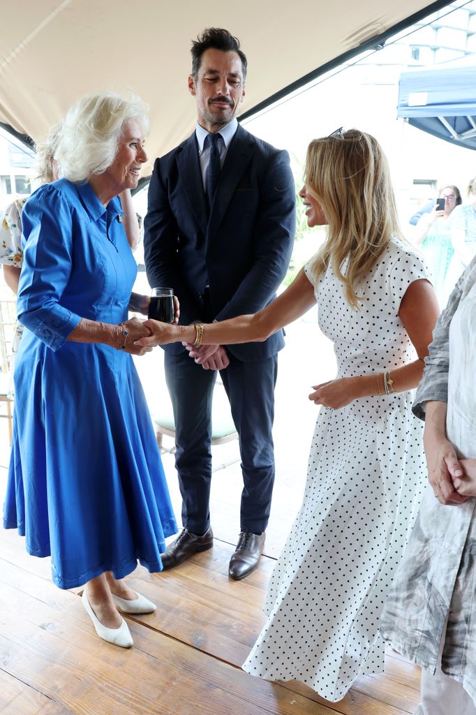 queen camilla speaking with amanda holden and david gandy 