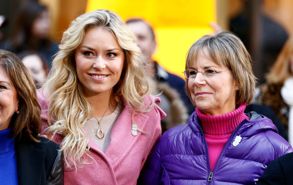 Lindsey Vonn in pick coat and Linda Krohn in purple puffer