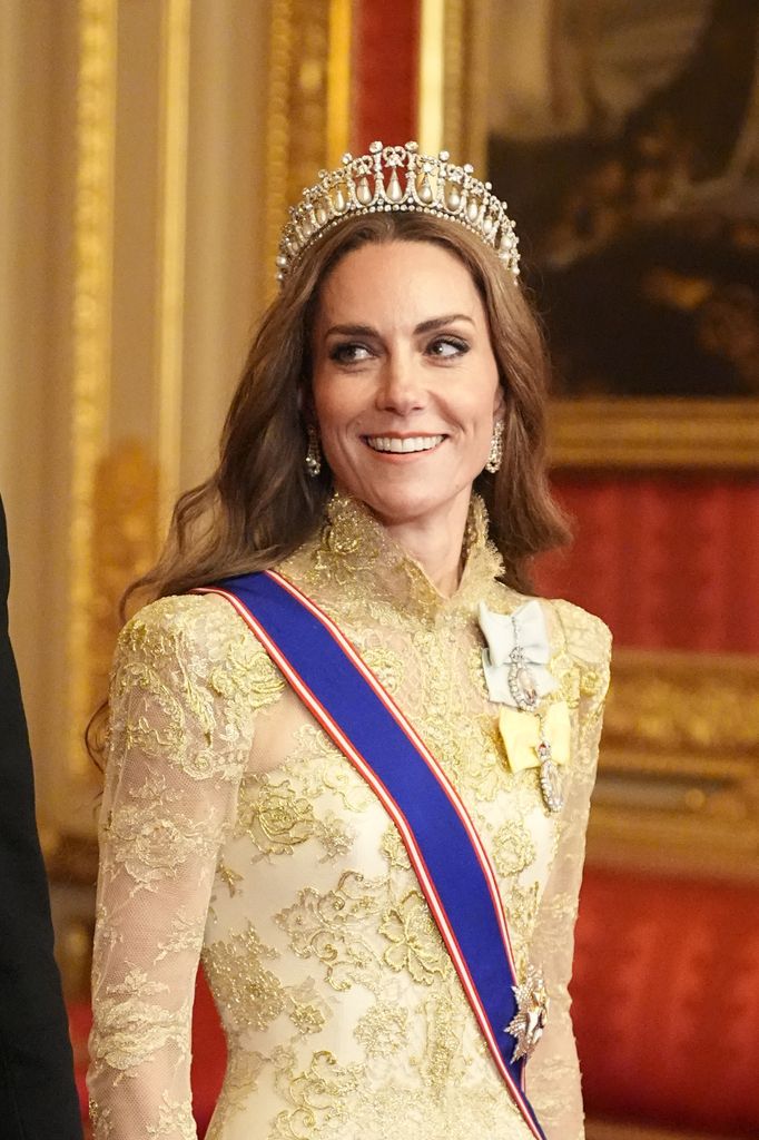 Kate Middleton in a gold dress and tiara