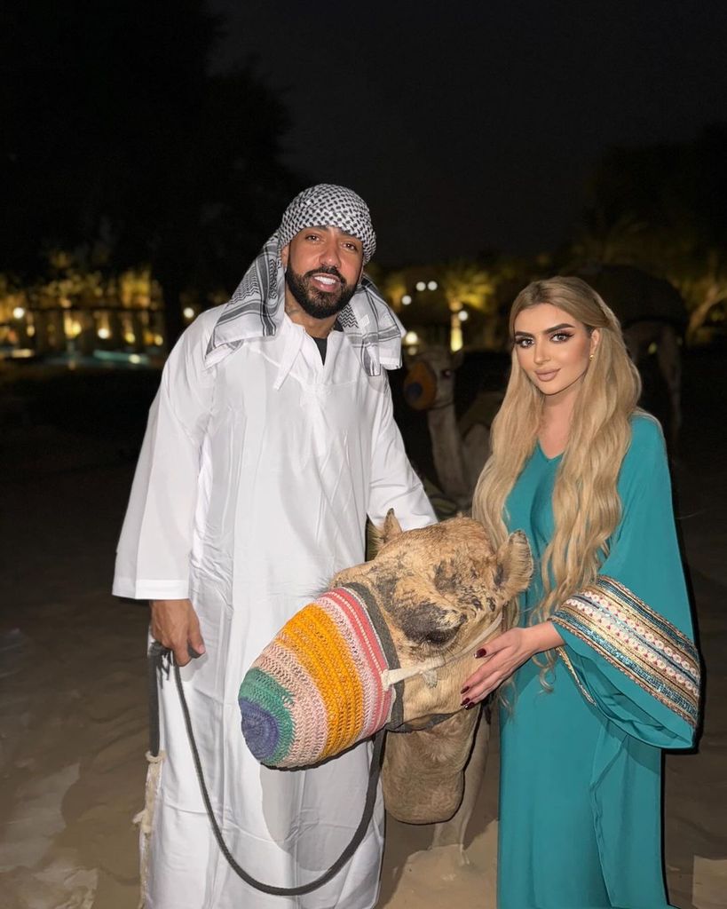 Sheikha Mahra in a green dress with French Montana and a camel