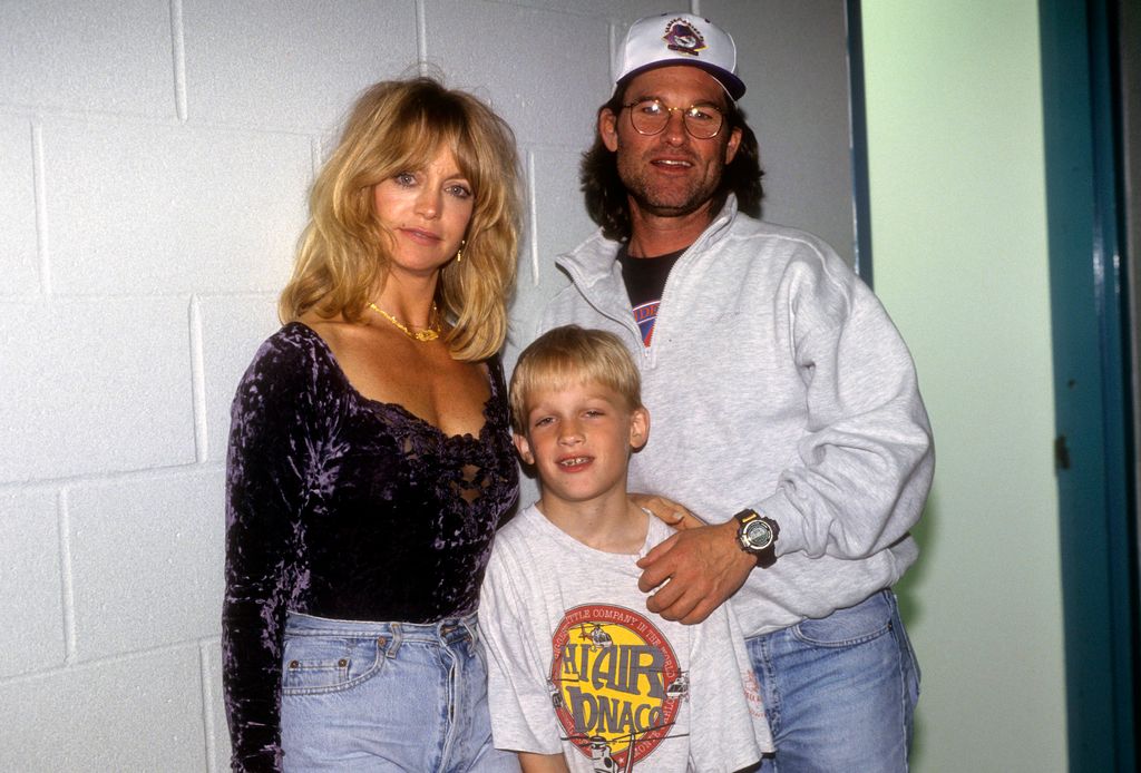 Goldie Hawn, Kurt Russell and Wyatt Russell appear backstage during a game between the Los Angeles Kings vs the St. Louis Blues at the LA Forum on March 20, 1995
