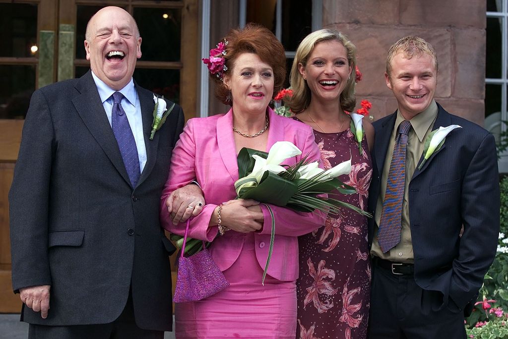 Coronation Street's Fred Elliot (John Savident) with his new bride Eve Sykes (Melanie Kilburn) after they are married in the hit soap based in Manchester