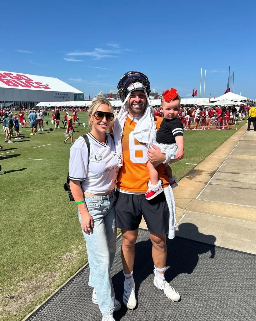 Baker Mayfield, Emily Wilkinson, and their daughter