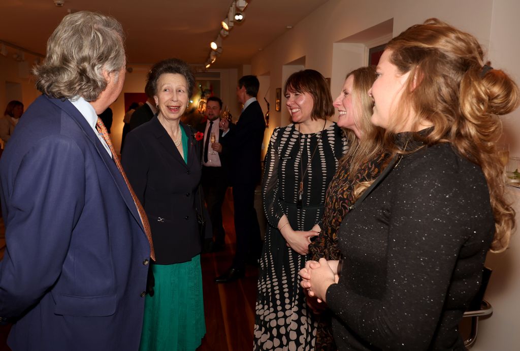 Princess Anne chatting with other event attendees