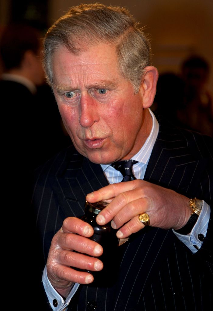 Prince Charles pulling a face holding jam