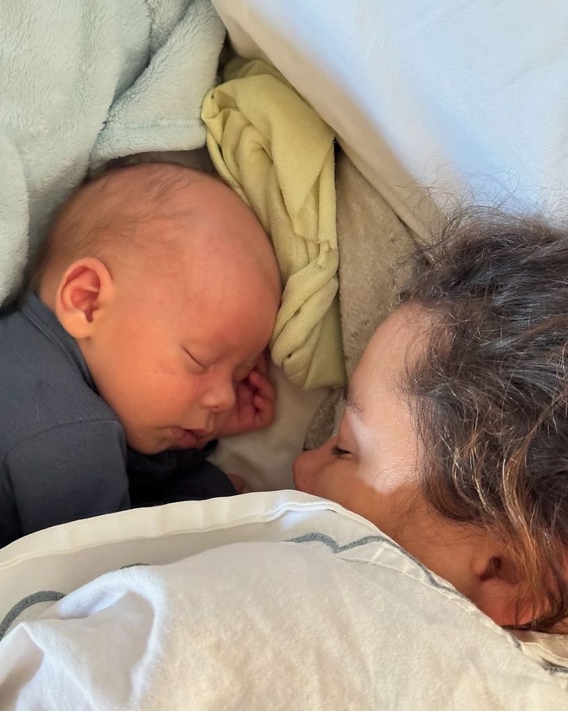 Baby Boydd enjoys a nap with mom