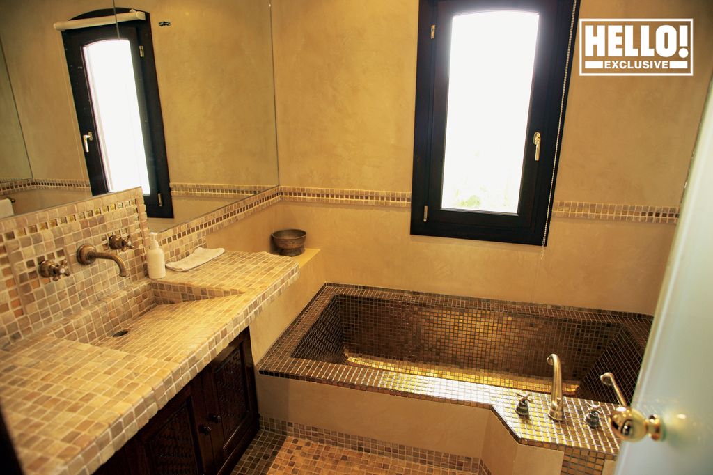 Kate Middleton's uncle Gary Goldsmith's gold bathroom with sunken tub