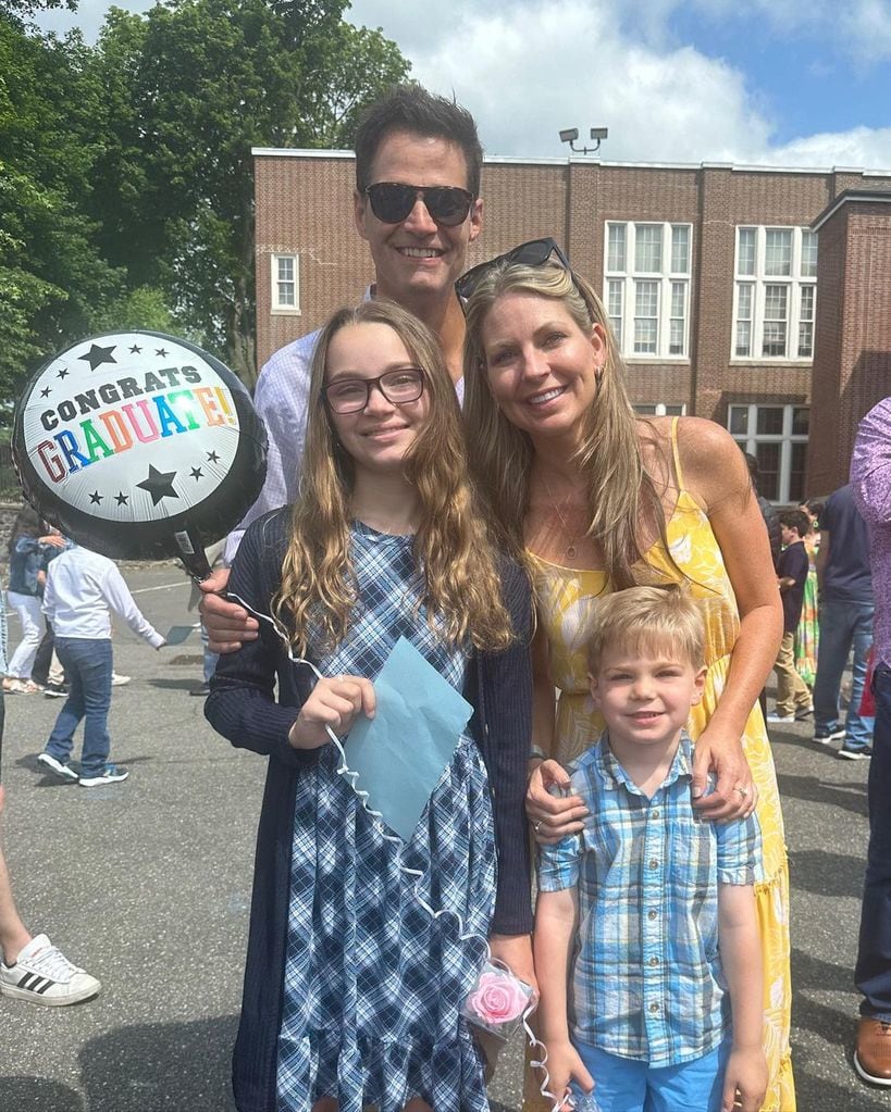 Rob Marciano with estranged wife Eryn and his children at their daughter's elementary school graduation