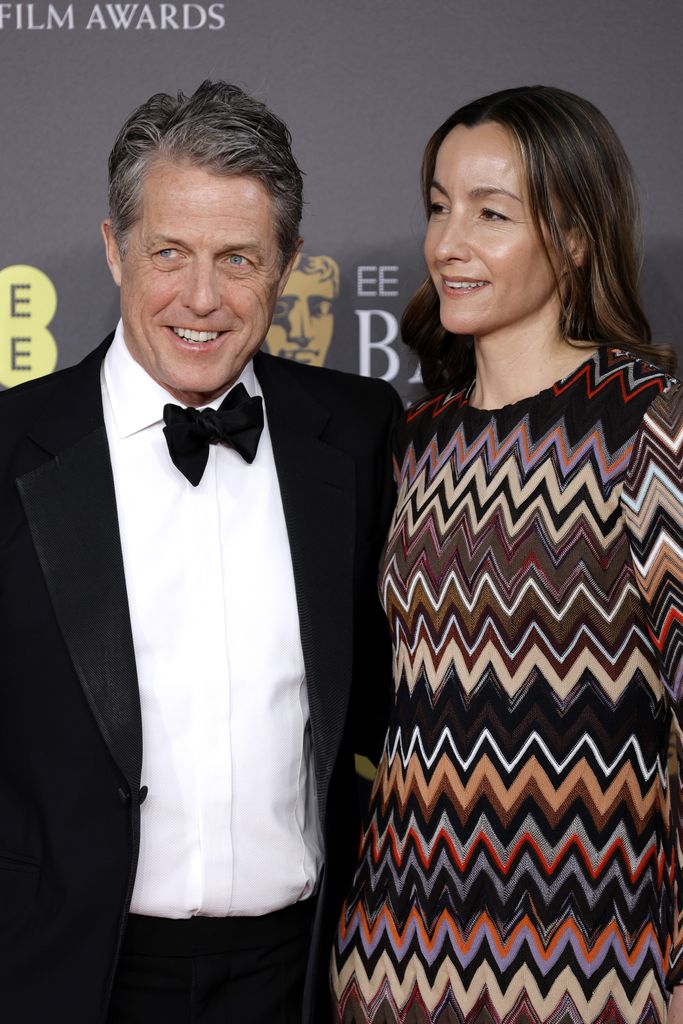 Hugh Grant and Anna Elisabet Eberstein attend the 2024 EE BAFTA Film Awards at The Royal Festival Hall on February 18, 2024 in London, England