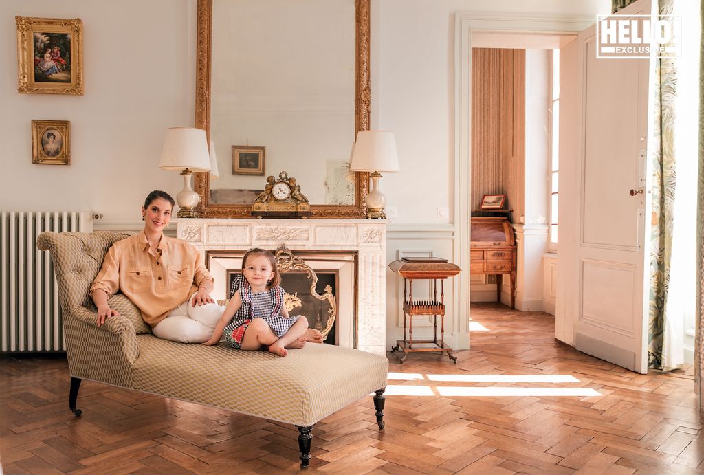 Baron Arnaud De Bastard's wife and daughter posing at Chateau de Saint-Denis