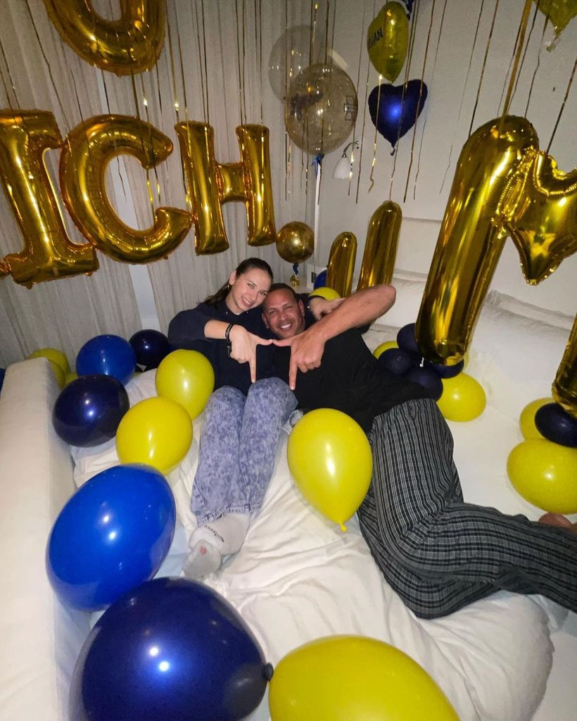 A-Rod poses with his daughter Natasha amongst a bed of baloons