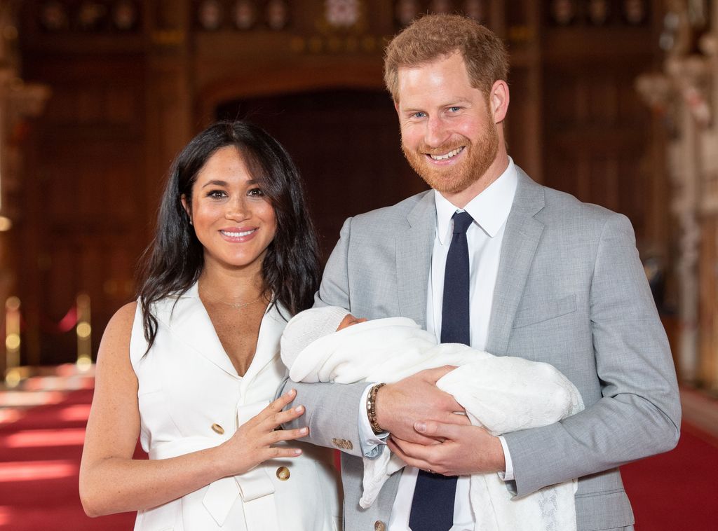 Harry holding newborn baby Archie