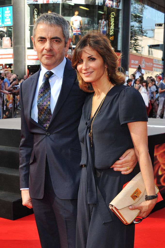 Rowan Atkinson and Sunetra Sastry attend the Johnny English Reborn UK premiere at Empire Leicester Square on October 2, 2011