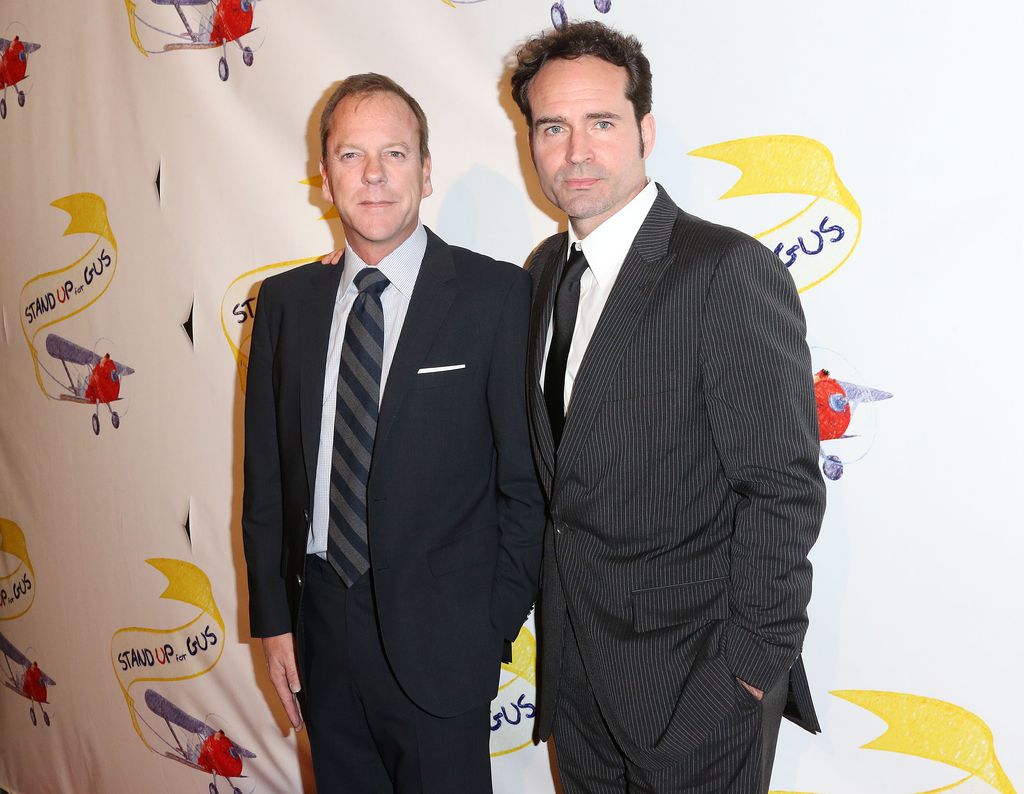 Actors Kiefer Sutherland and Jason Patric attend the "Stand Up For Gus" Benefit at Bootsy Bellows on November 13, 2013 in West Hollywood, California