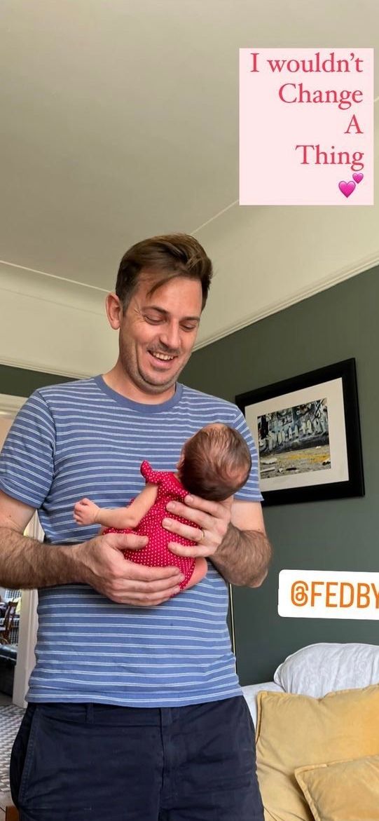 Nina Warhurst's husband Ted cradling newborn baby girl