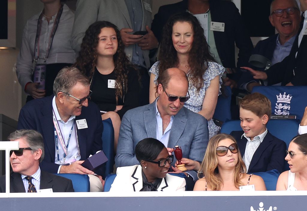 Prince William with Prince George at the Ashes 