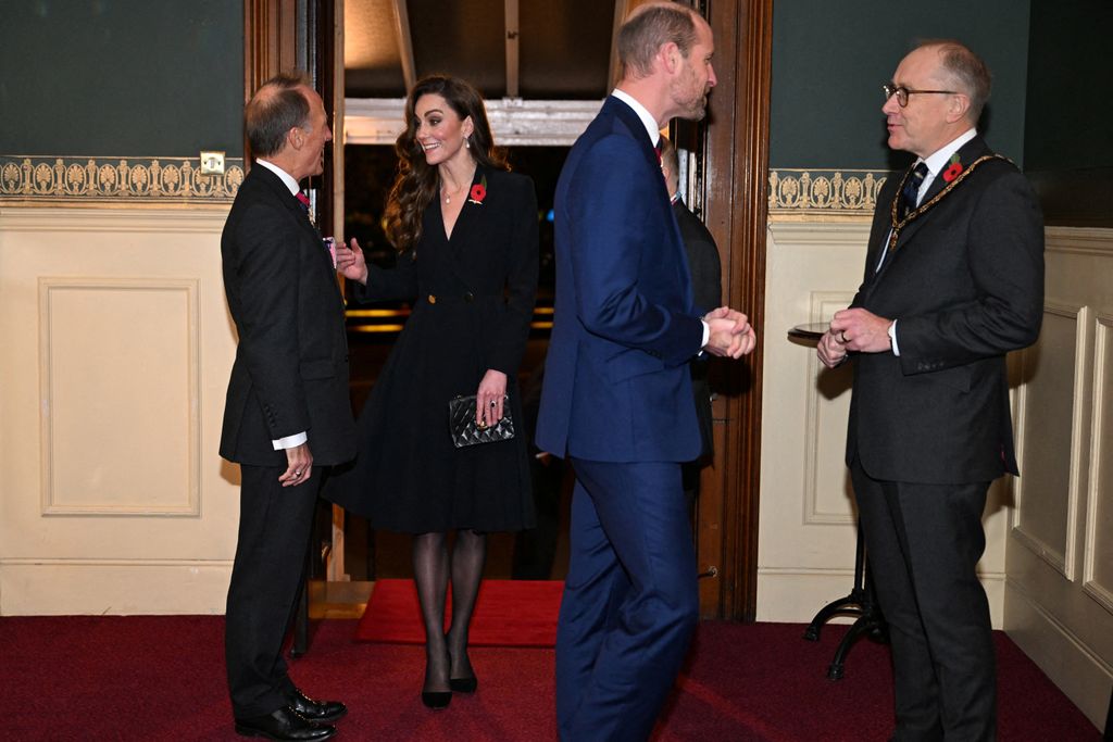 Britain's Catherine, Princess of Wales (2L) and Britain's Prince William, Prince of Wales (2R) attend "The Royal British Legion Festival of Remembrance" ceremony at Royal Albert Hall, in London, on November 9, 2024 