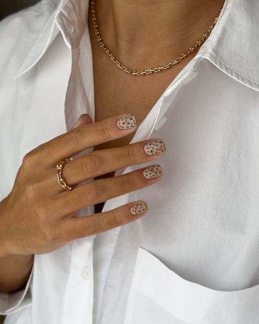 beige animal print nail manicure idea  
