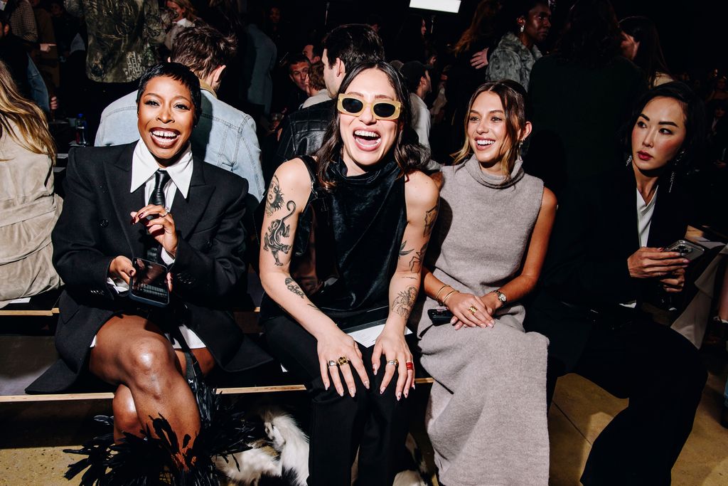 Jenee' Naylor (left) sits with Tefi (center) at Proenza Schouler RTW Fall 2024