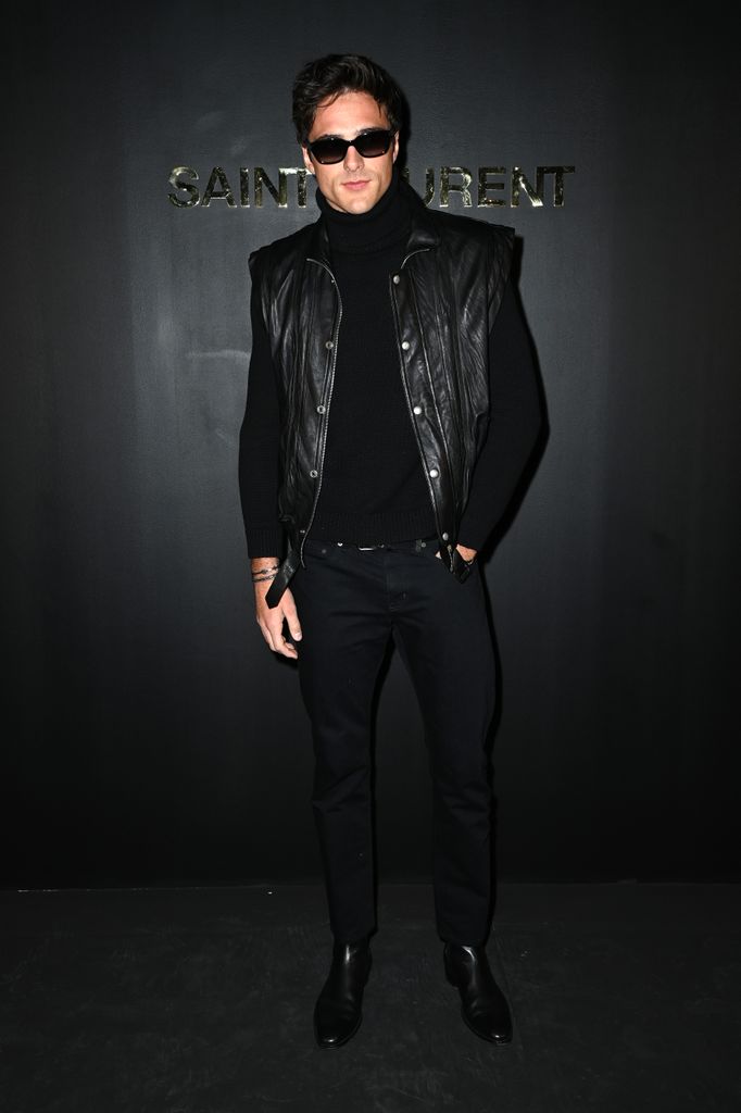  Jacob Elordi attends the Saint-Laurent Womenswear Fall/Winter 2022/2023 show as part of Paris Fashion Week on March 01, 2022 in Paris, France in all black