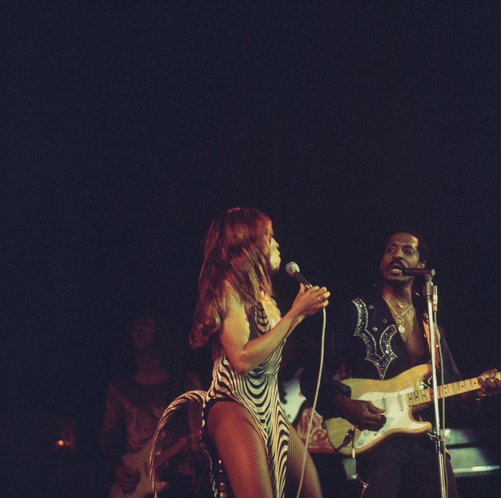 Tina Turner and Ike Turner (1931-2007) playing Fender Stratocaster guitars from the Ike & Tina Turner Revue, performed live on stage at the Hammersmith Odeon in London, 24 October 1975.