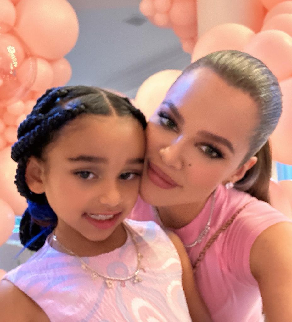 Khloe with dream in front of balloons
